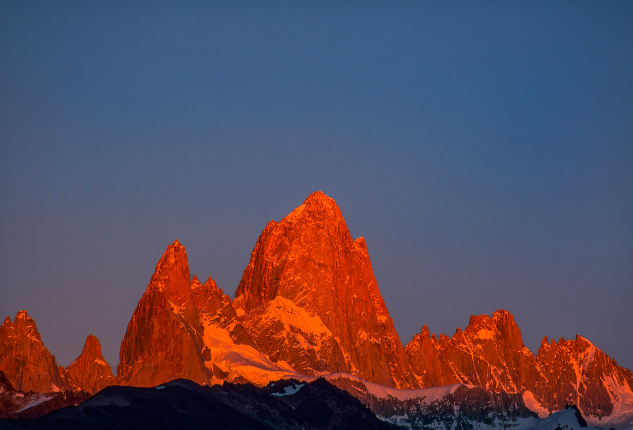 Orange mountains with blue sky